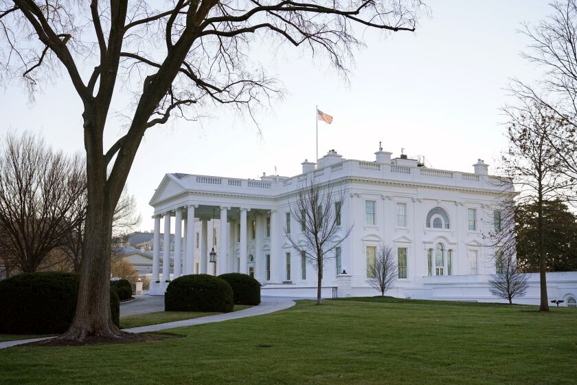 An American flag flies over the White House in Washington, Thursday, Jan. 7, 2021. (AP Photo/Patrick Semansky)