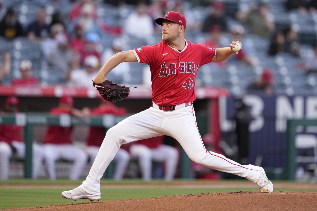 Angels starting pitcher Reid Detmers throws to the plate during the first inning.