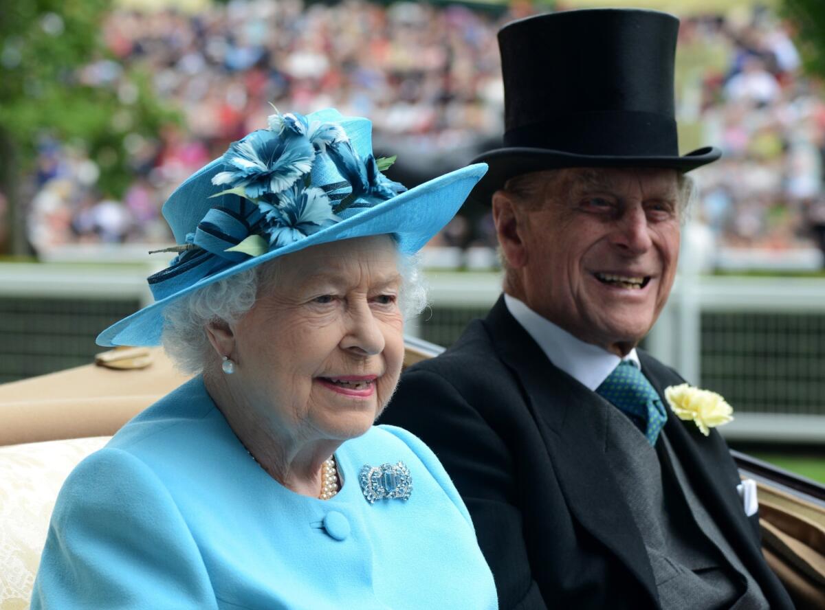 Queen Elizabeth II and Prince Philip, Duke of Edinburgh, attend the Royal Ascot at Ascot Racecourse in Ascot, England. The couple will visit Northern Ireland near the end of the month.