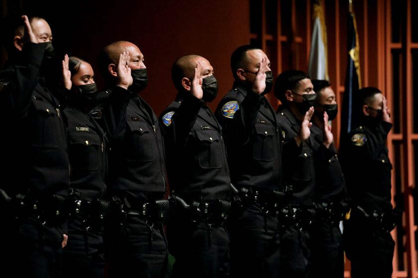 SAN FRANCISCO, CA - FEBRUARY 24: Thirteen members of the 274th Recruit Class take an oath at the San Francisco Police Department graduation ceremonty, attended by London Breed, mayor of San Francisco, at the Scottish Rite Masonic Center on Thursday, Feb. 24, 2022 in San Francisco, CA. Mayor Breed is the 45th mayor of the City and County of San Francisco. She was supervisor for District 5 and was president of the Board of Supervisors from 2015 to 2018. (Gary Coronado / Los Angeles Times)