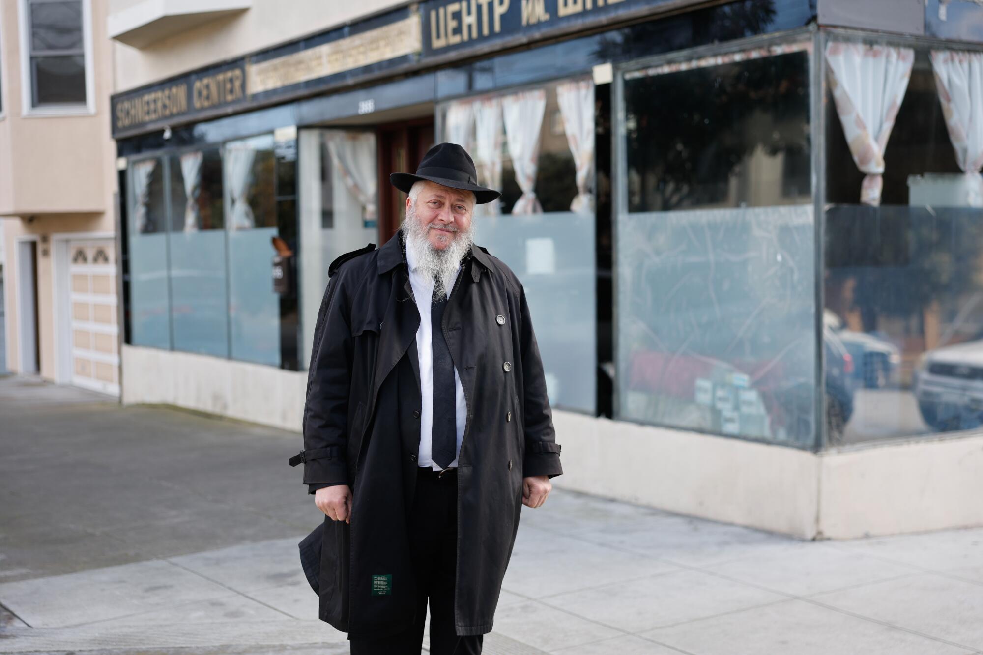 Rabbi Bentziyon Pil stands outside the Schneerson Jewish Center.