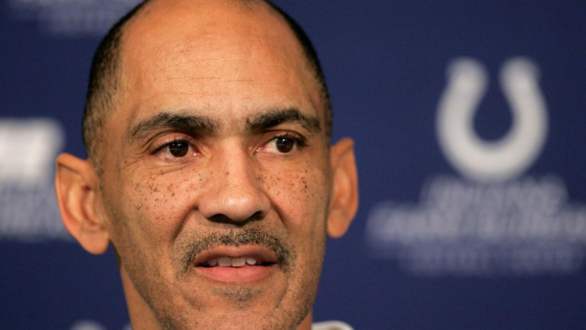 Then-Indianapolis Colts Coach Tony Dungy speaks during a news conference on Dec. 29, 2008.