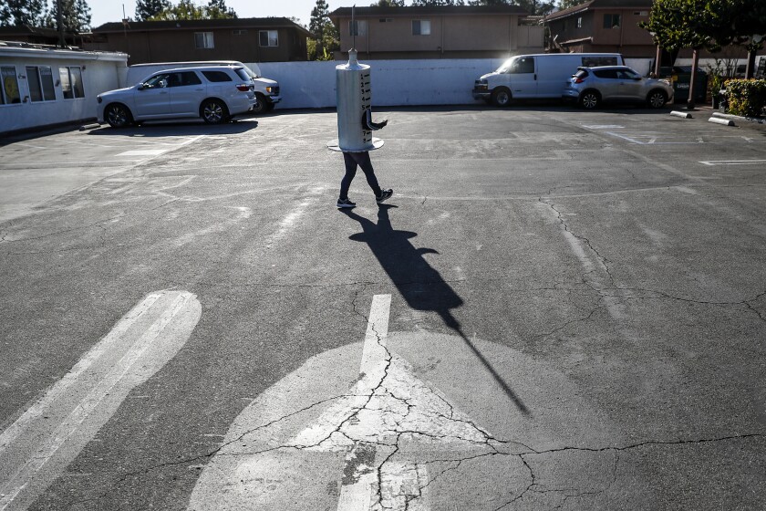 Socorro Juarez dresses up as a vaccine syringe and dances around trying to convince fellow Latinos to get vaccinated