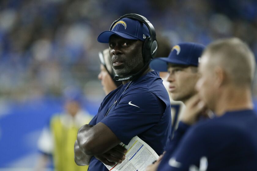 Los Angeles Chargers head coach Anthony Lynn watches in the first half of an NFL football game against the Detroit Lions in Detroit, Sunday, Sept. 15, 2019. (AP Photo/Duane Burleson)