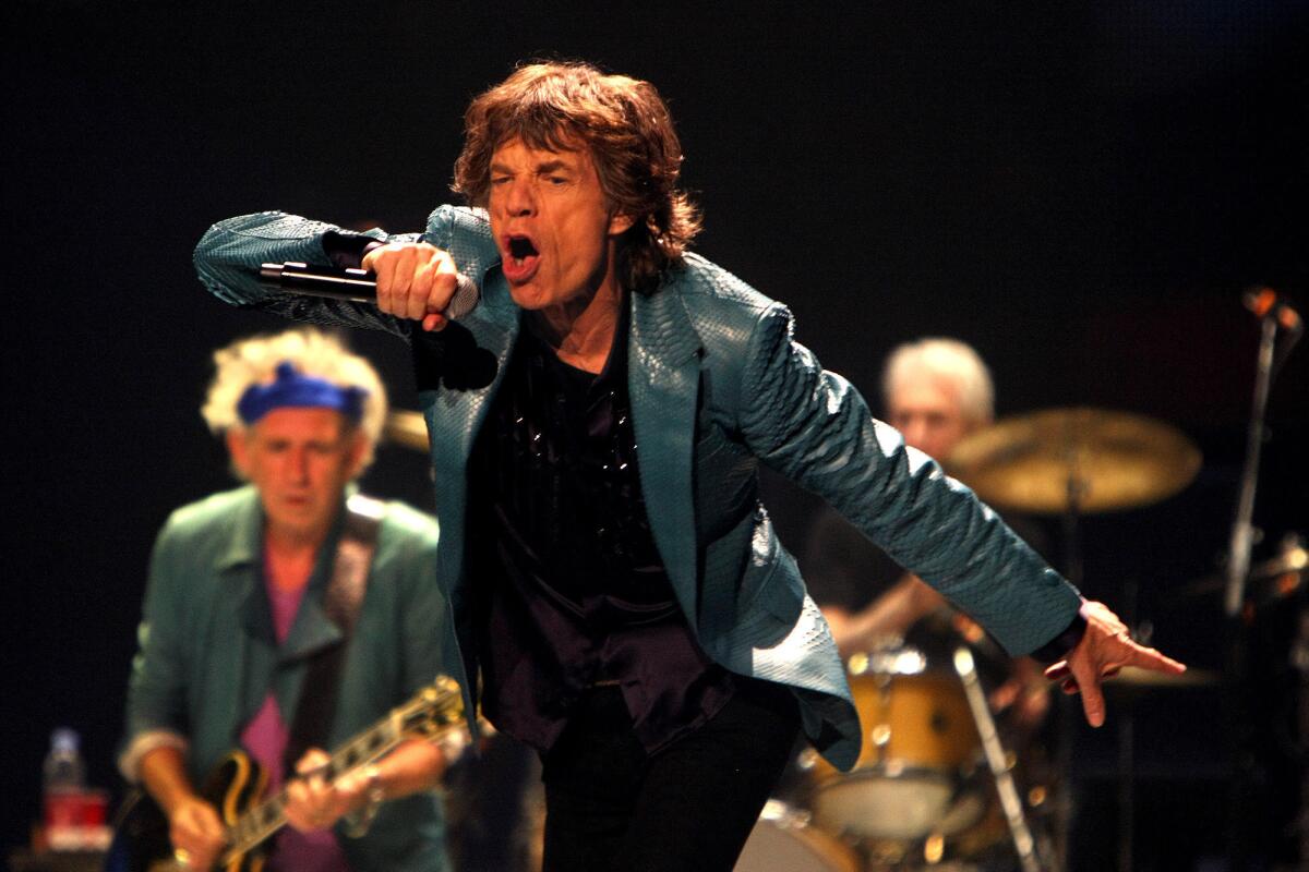 Mick Jagger, Keith Richards and Charlie Watts perform during the Rolling Stones' 50 & Counting tour at the Honda Center in Anaheim on May 15, 2013.