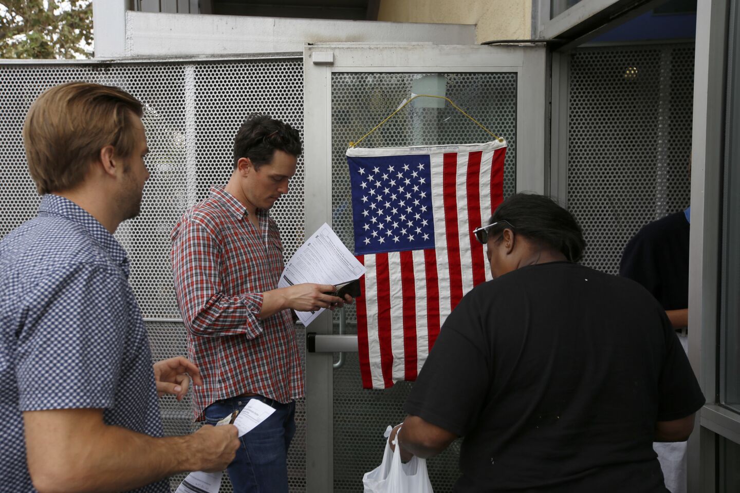 People wait in line to vote in the skid row neighborhood of Los Angeles.