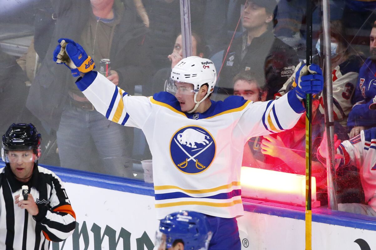 Buffalo Sabres right wing Victor Olofsson (71) celebrates after his goal which was later waved off during the third period of an NHL hockey game against the New York Rangers, Friday, Dec. 10, 2021, in Buffalo, N.Y. (AP Photo/Jeffrey T. Barnes)