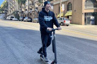 L.A. City Controller-elect Kenneth Mejia heading to his downtown campaign office.