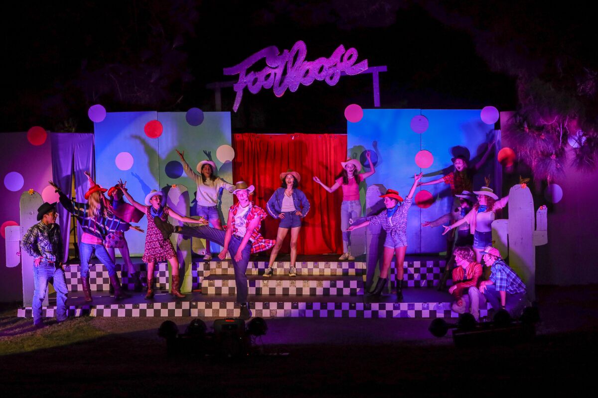 La Jolla High School students perform "Footloose the Musical" outdoors.