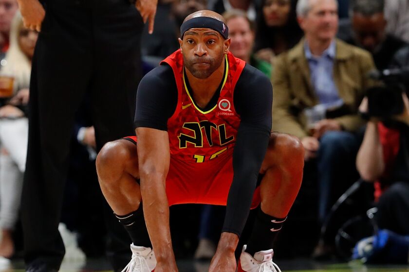 ATLANTA, GEORGIA - NOVEMBER 05: Vince Carter #15 of the Atlanta Hawks reacts during the second half against the San Antonio Spurs at State Farm Arena on November 05, 2019 in Atlanta, Georgia. NOTE TO USER: User expressly acknowledges and agrees that, by downloading and/or using this photograph, user is consenting to the terms and conditions of the Getty Images License Agreement. (Photo by Kevin C. Cox/Getty Images)
