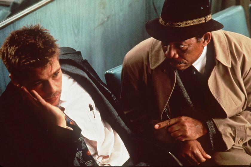 Brad Pitt, left, and Morgan Freeman star in David FIncher's "Seven" in 1995.
