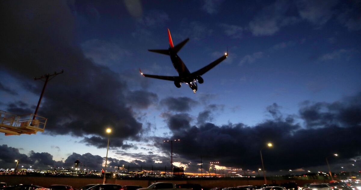 O.C. man charged after allegedly punching attendant on flight from Mexico to LAX O.C. man charged after allegedly punching attendant on flight from Mexico to LAX