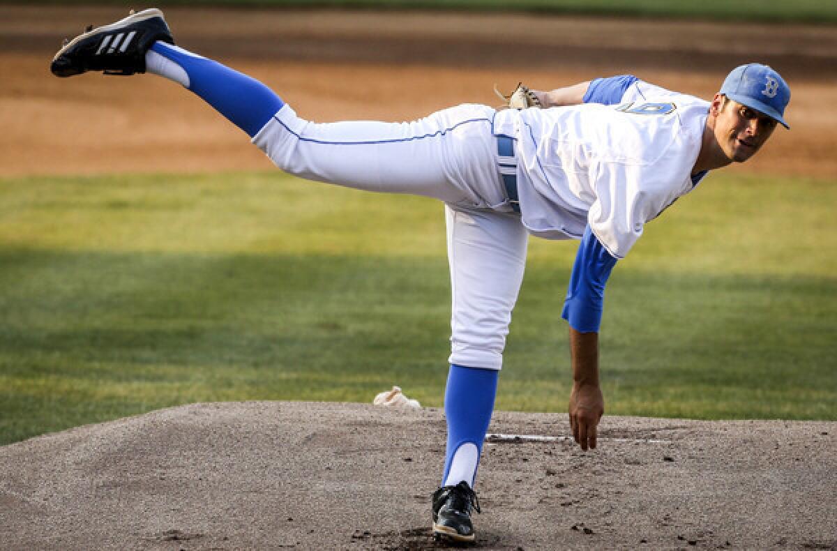 UCLA starter Adam Plutko delivers a pitch against San Diego State during a regional game two weeks ago.