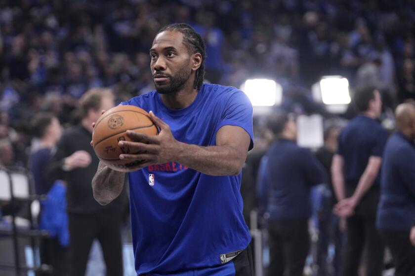 Los Angeles Clippers' Kawhi Leonard warms up before Game 2 of an NBA basketball first-round playoff series against the Dallas Mavericks in Dallas, Friday, April 26, 2024. (AP Photo/Tony Gutierrez)
