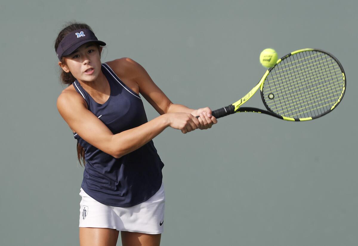 Marina’s Mika Ikemori competes in the CIF Southern Section Individuals tournament round of 16 singles match on Dec. 5 at Seal Beach Tennis Center.
