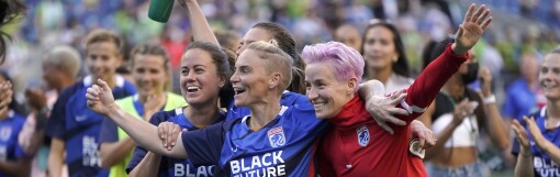 CORRECTS FINAL SCORE TO 2-1 INSTEAD OF 3-1 - From left, OL Reign's Lauren Barnes.