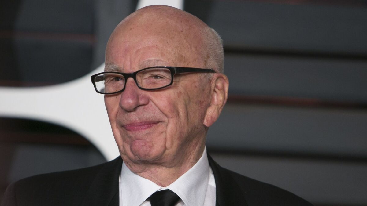 21st Century Fox Executive Chairman Rupert Murdoch arrives at the 2015 Vanity Fair Oscar party in Beverly Hills.