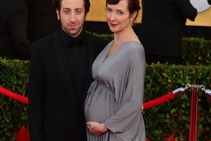 "The Big Bang Theory's" Simon Helberg, left, and his wife, Jocelyn Towne, have welcomed a baby boy.