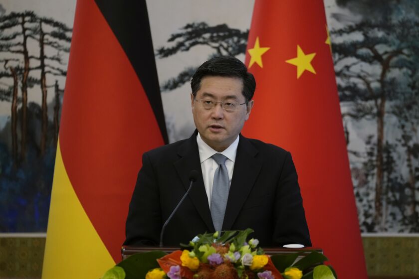 Chinese Foreign Minister Qin Gang speaks during a joint press conference with German Foreign Minister Annalena Baerbock at the Diaoyutai State Guesthouse in Beijing Friday, April 14, 2023. (Suo Takekuma/Pool Photo via AP)