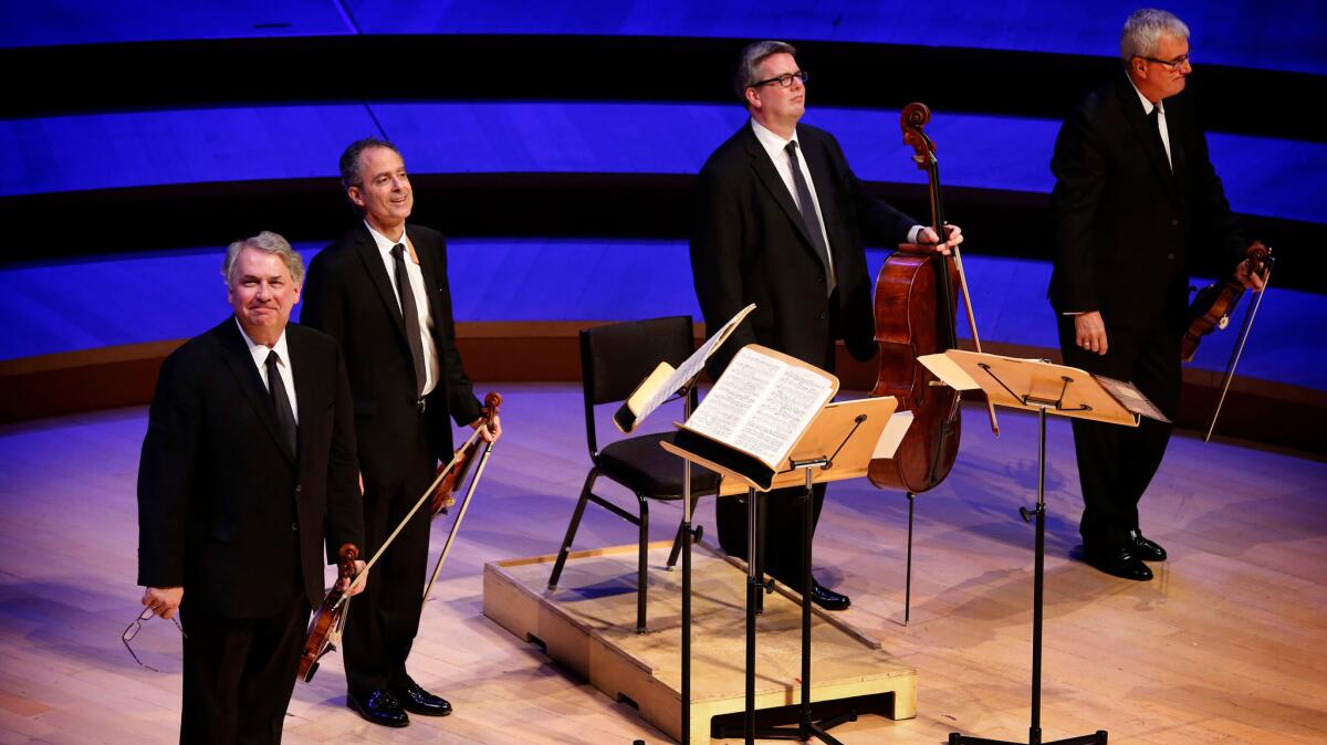 Philip Setzer, left, Eugene Drucker, Paul Watkins and Larry Dutton of the Emerson String Quartet.