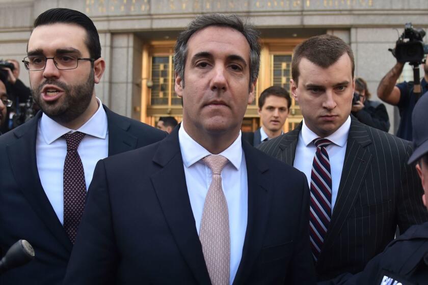 (FILES) In this file photo taken on April 26, 2018 US President Donald Trump's personal lawyer Michael Cohen(C) leaves the US Courthouse in New York on April 26, 2018. Michael Cohen, Donald Trump's personal lawyer, faced growing scrutiny May 9, 2018 following revelations that a shell company he established received millions of dollars from a Russian oligarch and corporations seeking White House access.Cohen, Trump's attorney and fixer for the past decade, is under criminal investigation in New York and his home and office were raided by the FBI last month. / AFP PHOTO / HECTOR RETAMALHECTOR RETAMAL/AFP/Getty Images ** OUTS - ELSENT, FPG, CM - OUTS * NM, PH, VA if sourced by CT, LA or MoD **