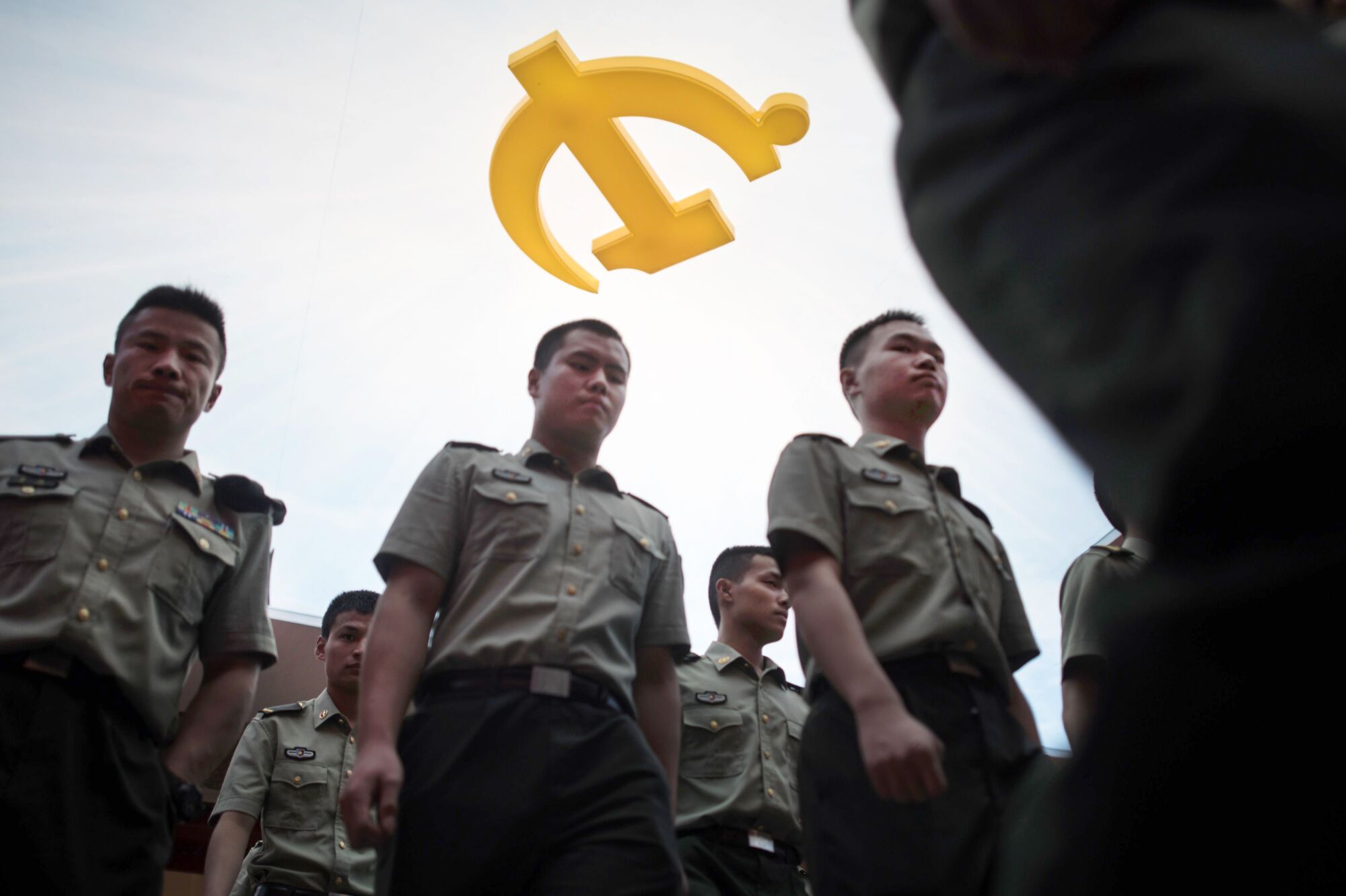 Chinese troops visit an exhibition marking the 90th anniversary of the army's founding in Beijing.