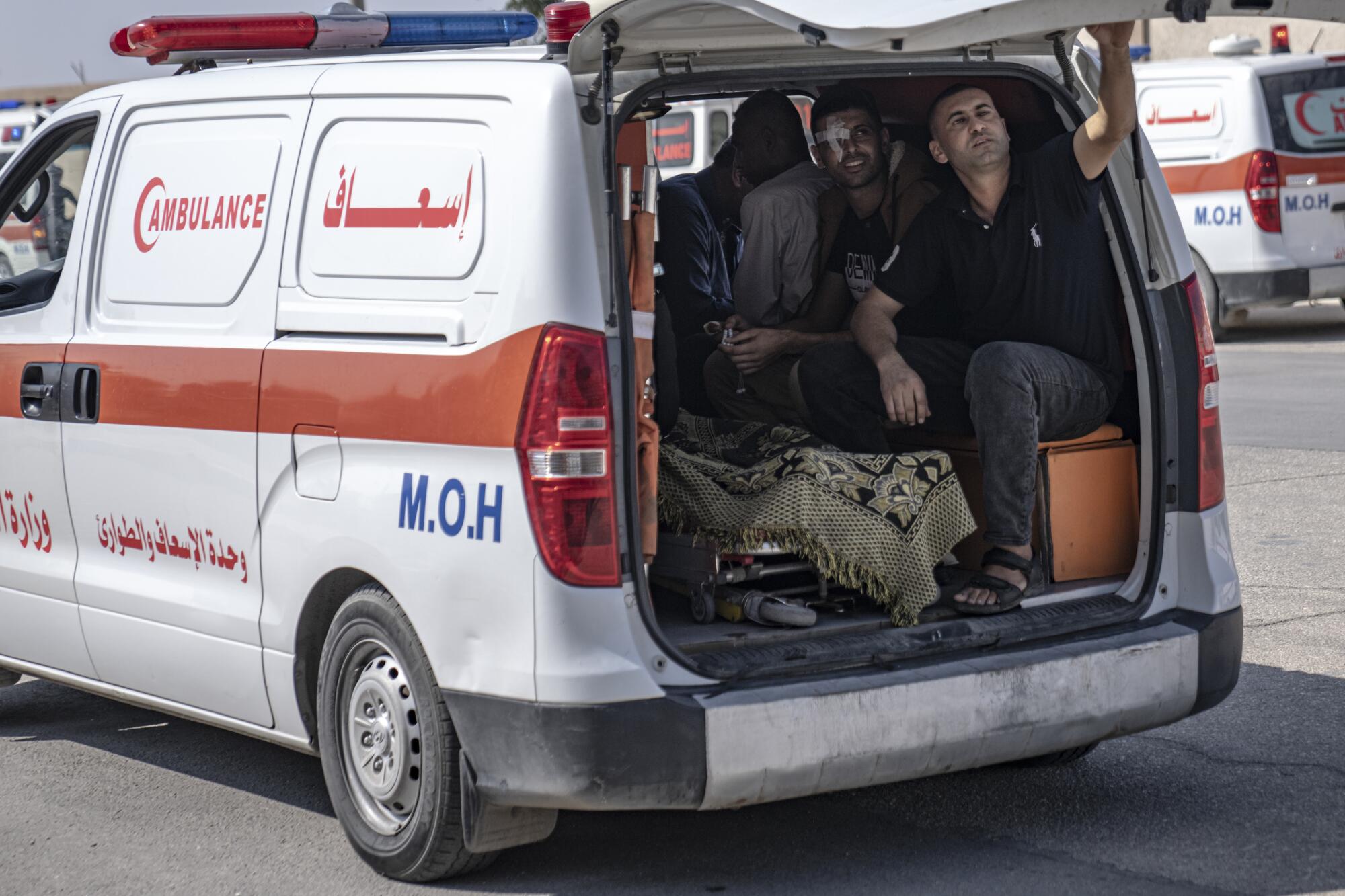 Ambulance with wounded Palestinians