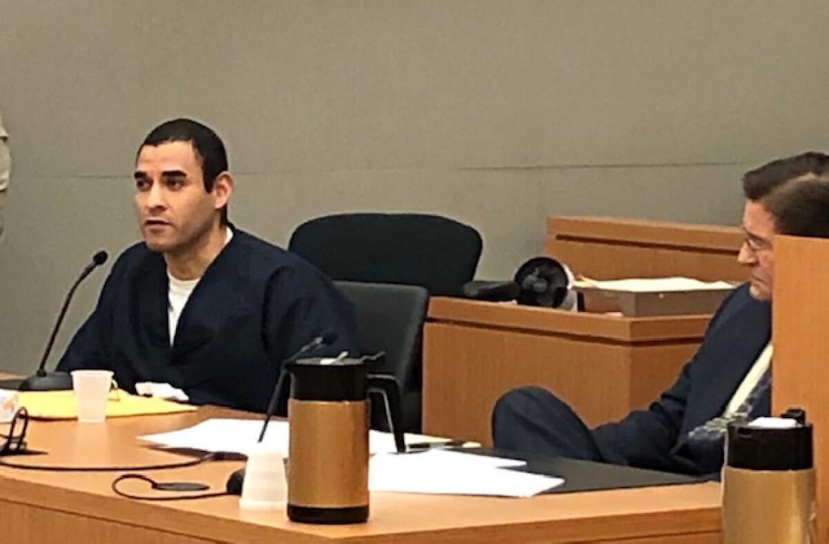 Henry Lopez, with defense attorney Paul Neuharth Jr. at right, told the judge at sentencing Wednesday that justice was not done at his conviction.