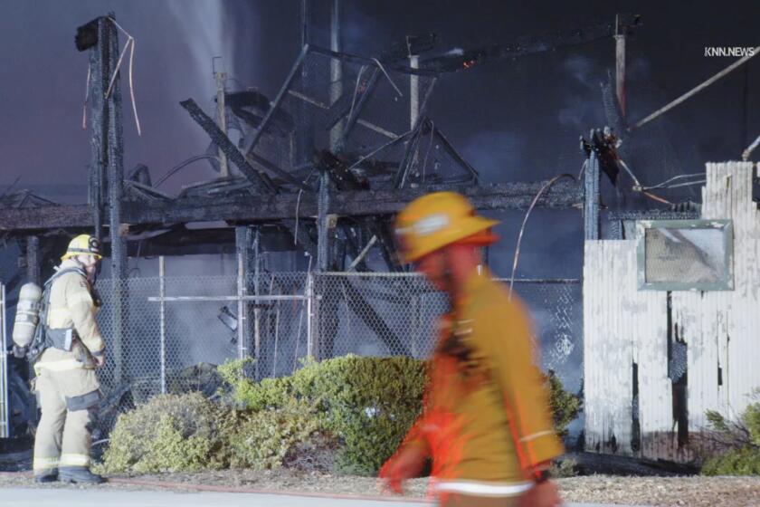 Firefighters on scene at Jay Littleton Ballpark, a ballpark in Ontario used in the filming of several popular baseball movies, that went up in flames overnight.