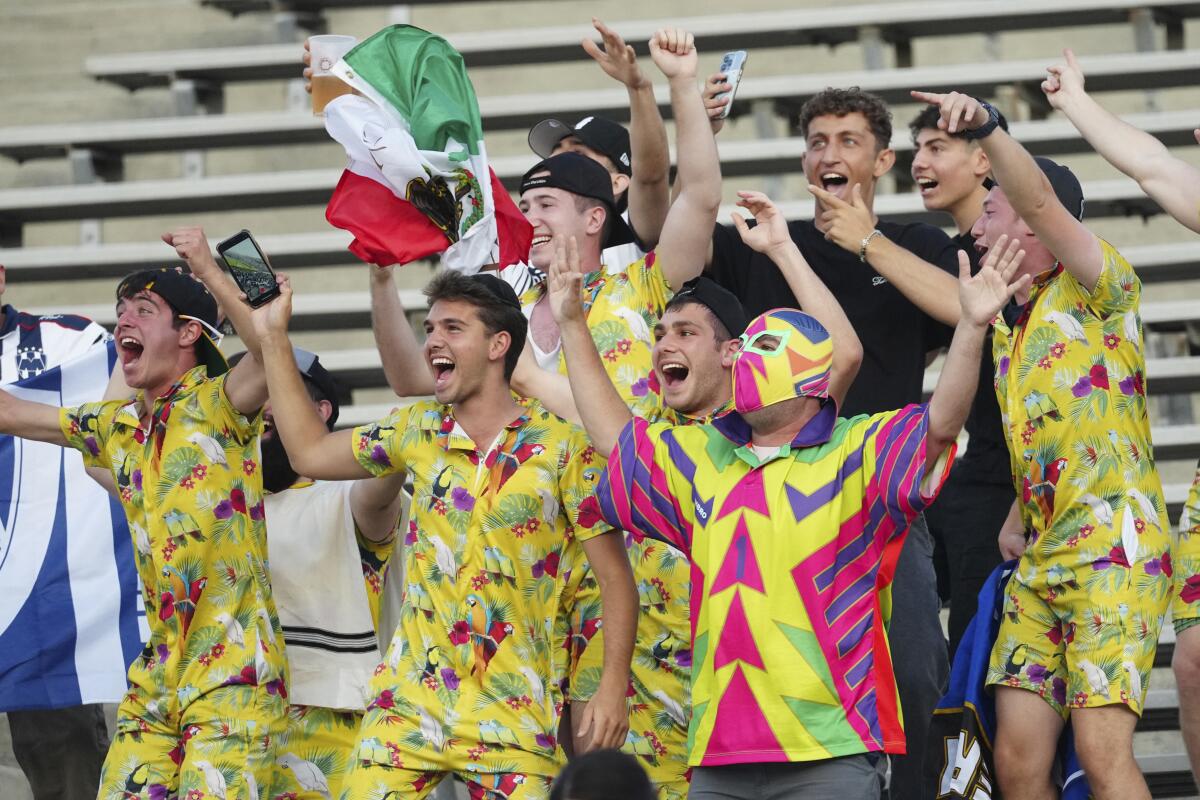 Monterrey's fans cheer for their team during the Club W