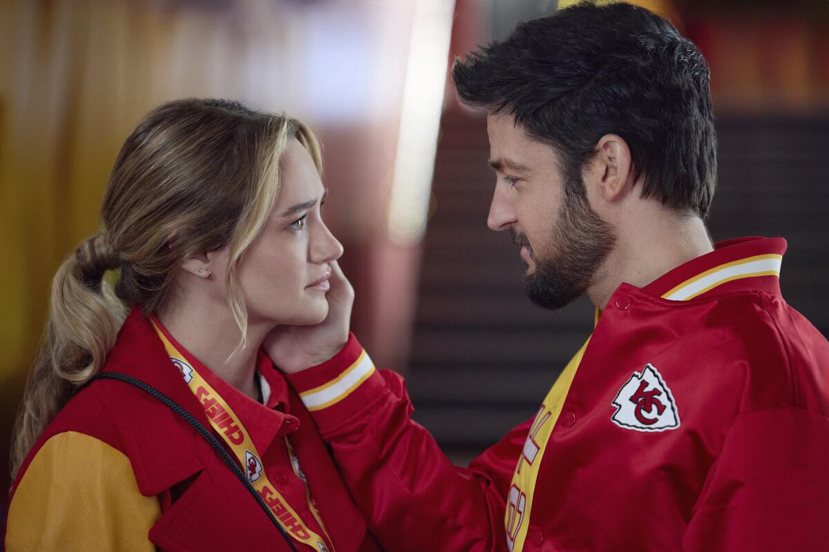 Hunter King, left, and Tyler Hynes star in "Holiday Touchdown: A Chiefs Love Story."