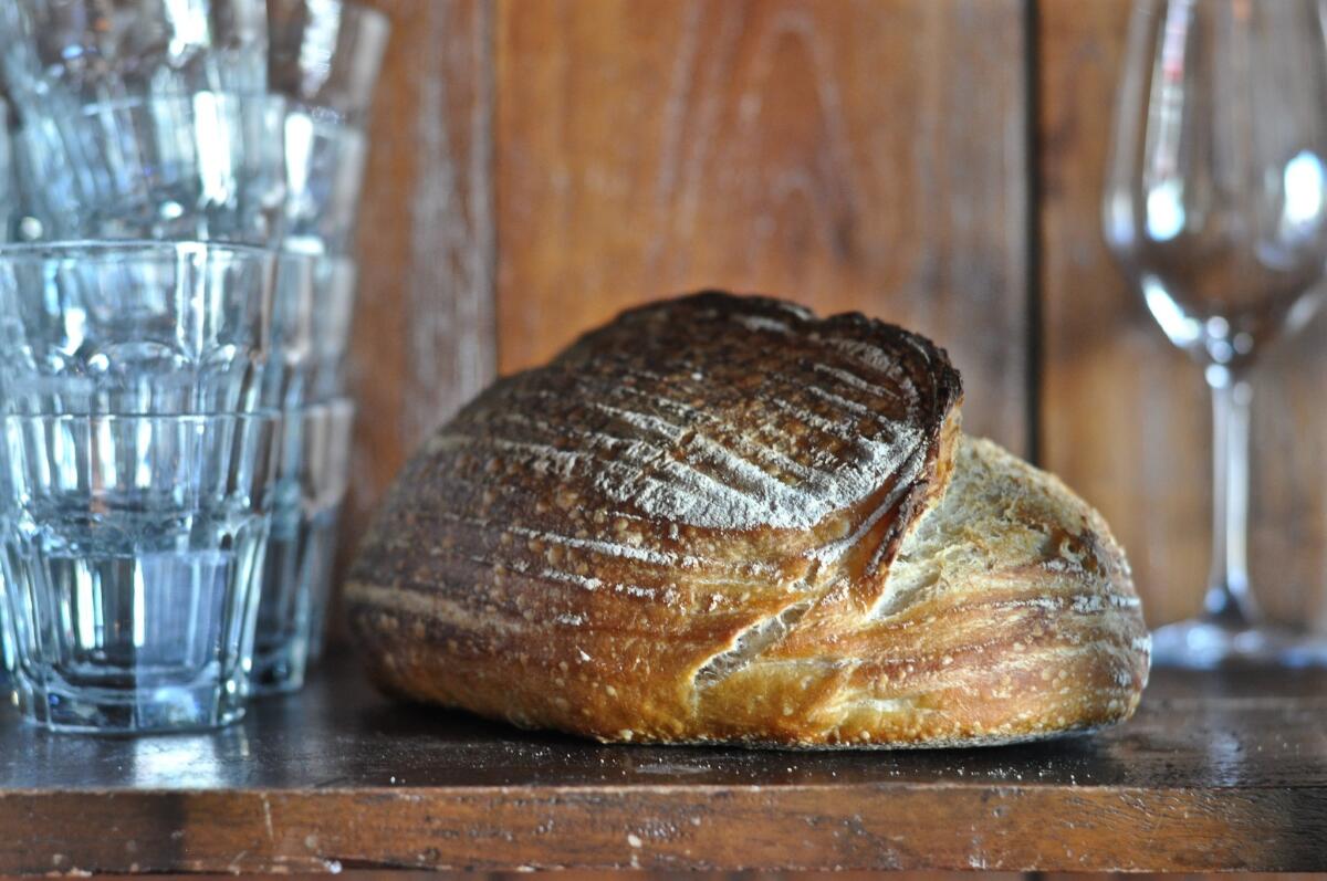 A loaf of sourdough bread at Republique.