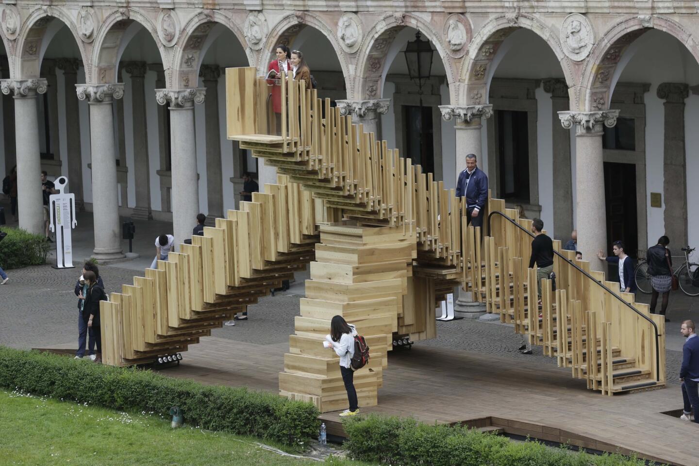 The installation "Scale Infinite" is displayed at the Milan Design Fair. The sprawling Milan furniture show is the largest and most prestigious in the world, capitalizing on Italian excellence in furniture design and craftsmanship.