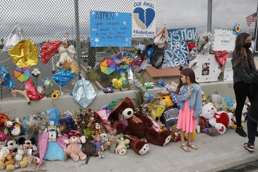 A memorial shrine in honor of Aiden Leos has grown to hundreds of stuffed animals on an overpass above the 55 freeway in Orange. Two suspects have been arrested in the freeway shooting case that took the life of the Costa Mesa 6-year-old.