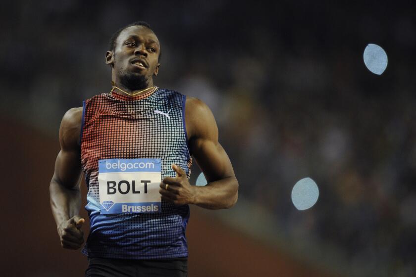 Usain Bolt, shown competing in the 2013 Diamond League event in Paris, has withdrawn from the 2015 meet this weekend because of discomfort in his left leg.