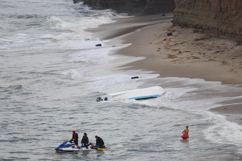 A panga that officials said was being used to smuggle people into the country capsized in Sunset Cliffs early Monday; 15 people were detained and turned over to Border Patrol agents.