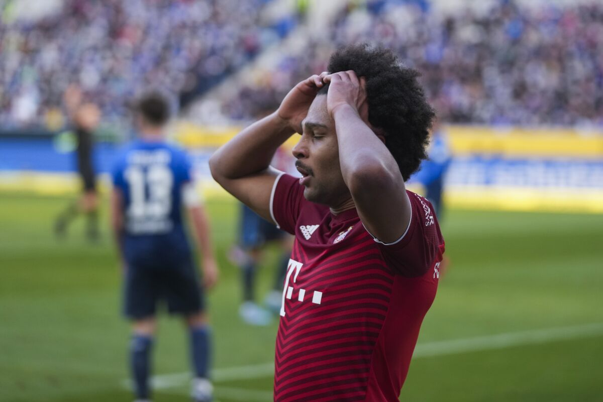 Bayern's Serge Gnabry gestures after missing a chance during a German Bundesliga soccer match between TSG 1899 Hoffenheim and Bayern Munich in Sinsheim, Germany, Saturday, March 12, 2022. The match ended in a 1-1 draw. (AP Photo/Michael Probst)