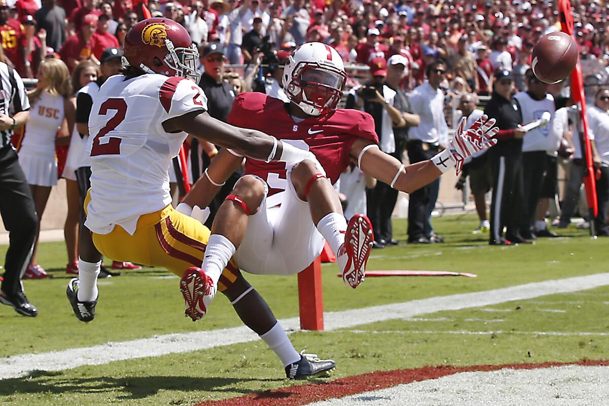 Stanford receiver Michael Rector can't come up with the ball as USC cornerback Adoree' Jackson knocks it away during a Sept. 6 game at Stanford Stadium.