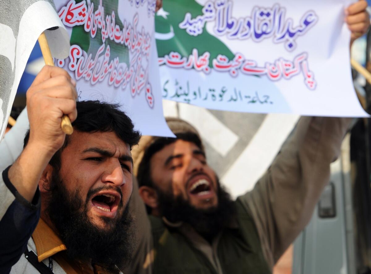 Pakistani supporters of banned Islamic group Jamaat-ud-Dawa shout slogans during a protest against the execution of Bangladeshi Islamist leader Abdul Quader Molla in Rawalpindi.