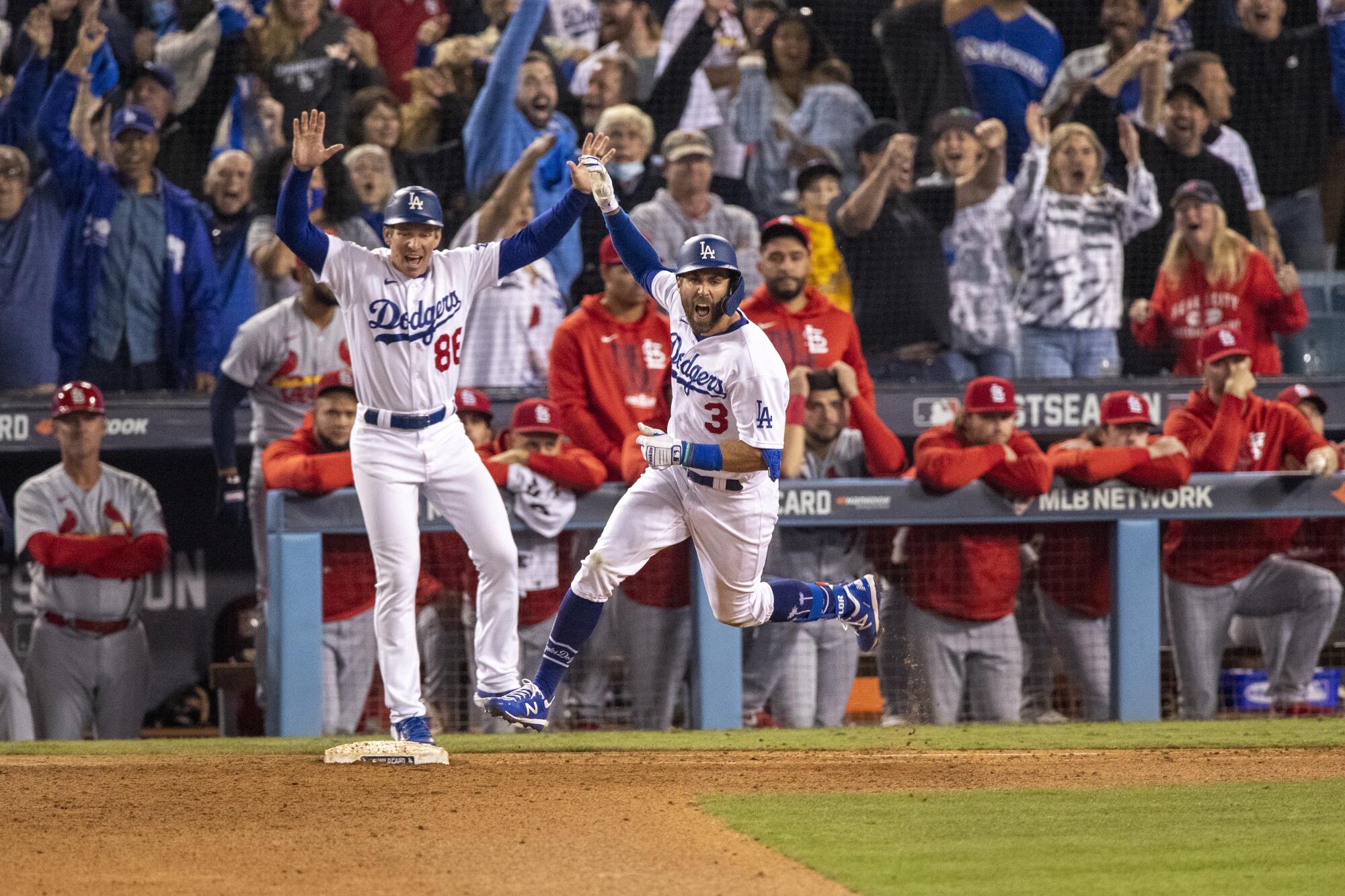 Los Angeles Dodgers left fielder Chris Taylor (3) reacts while running the bases after his two-run home run