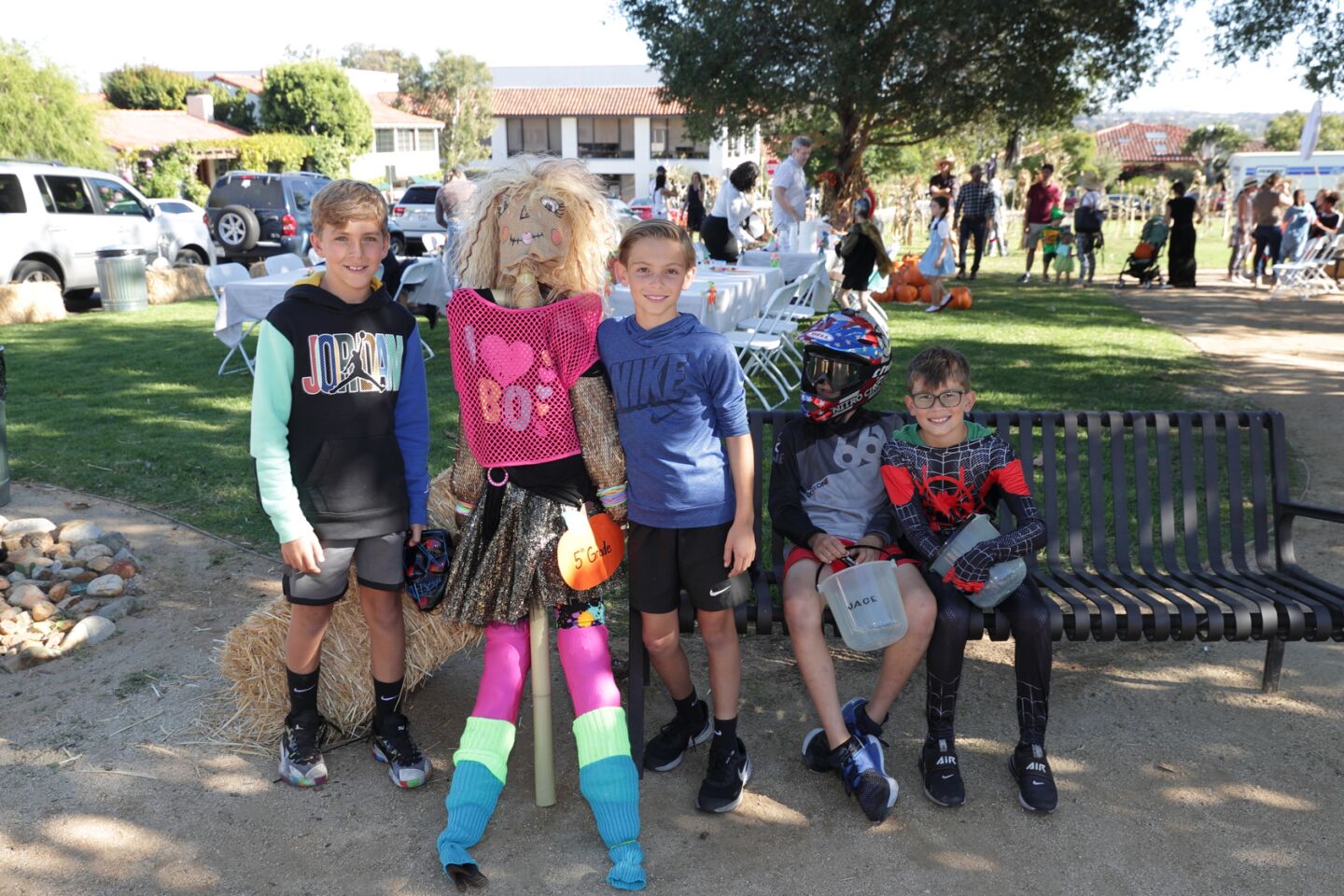 Carter Hill, Jaxon Stankoski, Stephen Svajian, and Jace Valentine with the 5th Grade Scarecrow