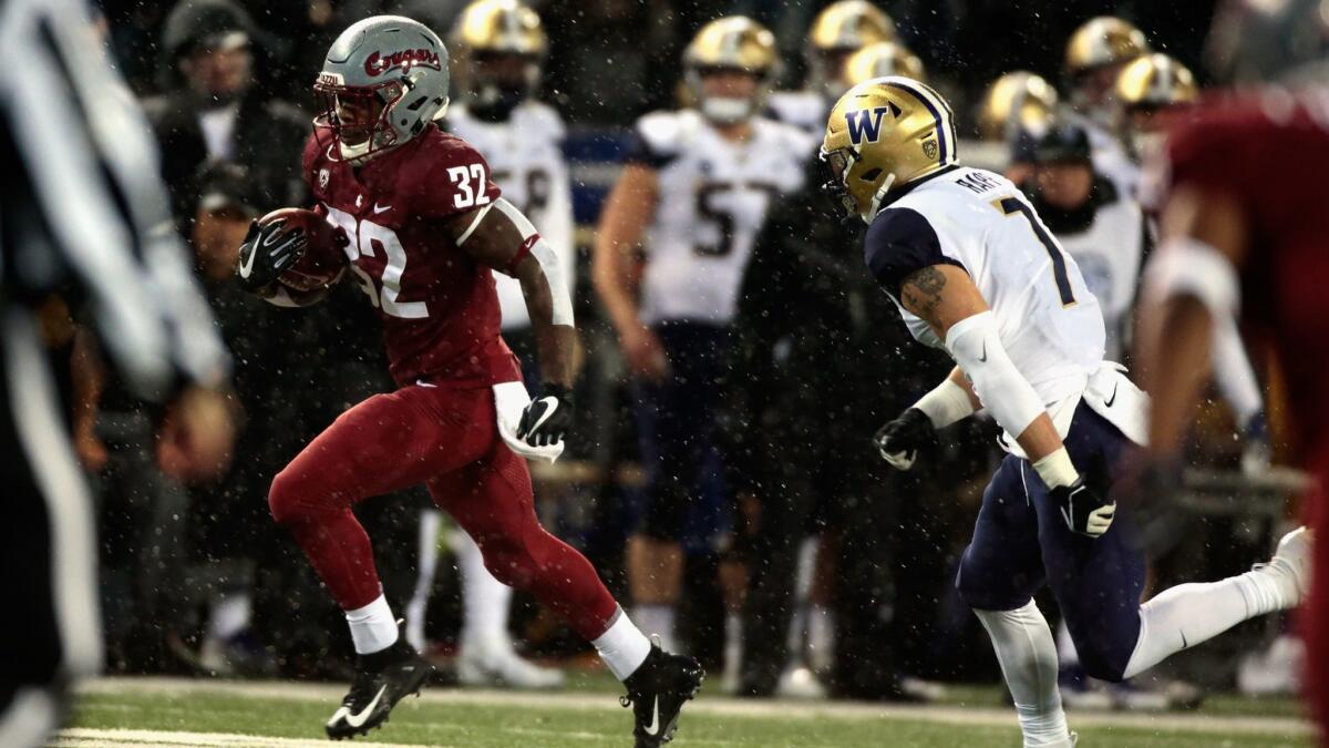 Burbank High alumnus James Williams, left, and No. 13-ranked Washington State (10-2) finished tied atop the PAC-12 North Division and will be heading to San Antonio to take on No. 24 Iowa (8-4) in the Alamo Bowl on Dec. 28. The game is scheduled for 6 p.m. on ESPN.