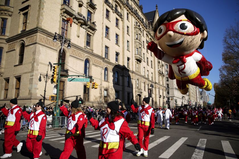 The Red Titan balloon makes its way down Central Park West during the Macy's Thanksgiving Day Parade, Thursday, Nov. 24, 2022, in New York. (AP Photo/Julia Nikhinson)