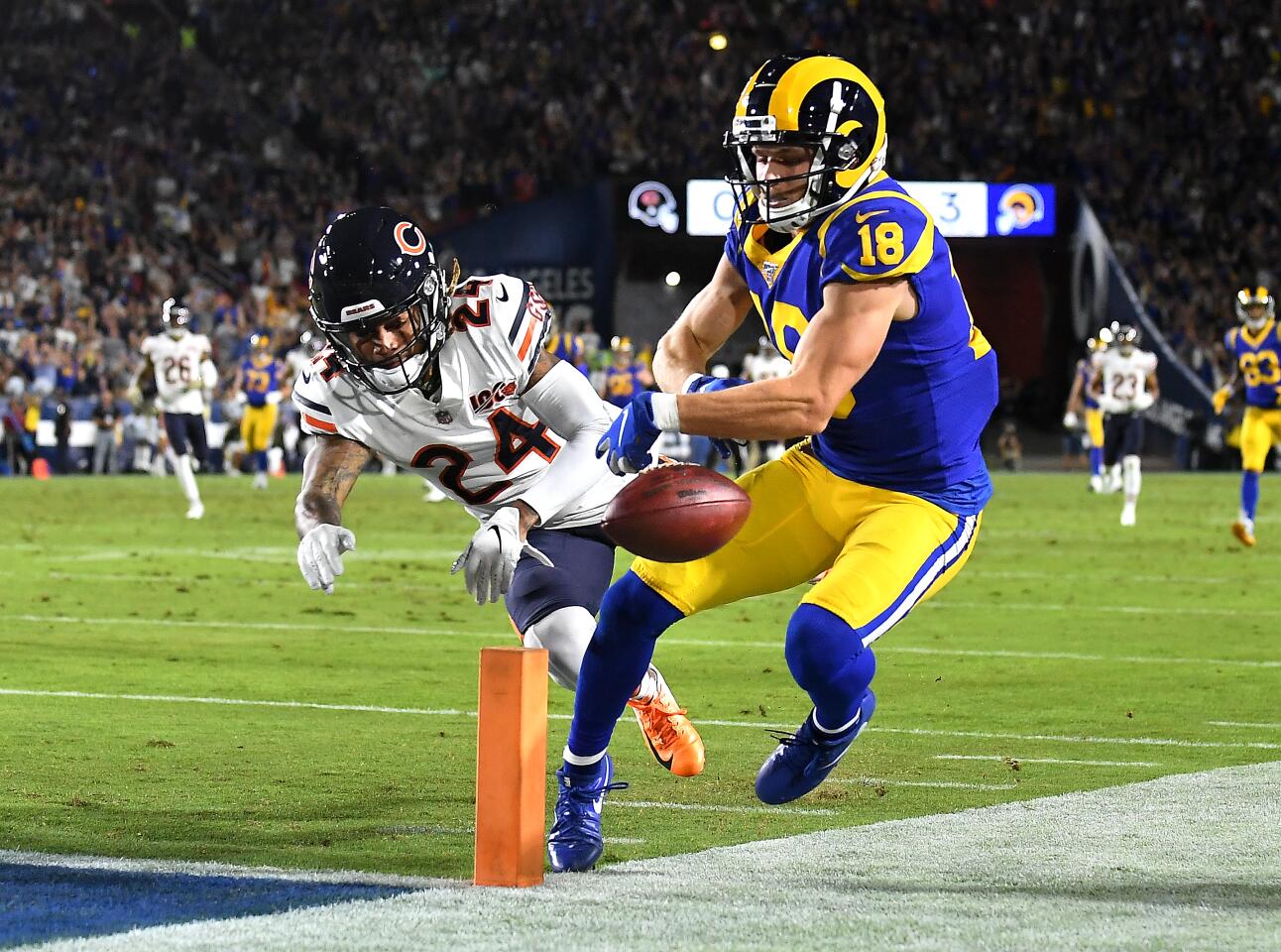 Rams receiver Cooper Kupp fumbles the ball out of bounds at the one-yard line after making a big catch in front of Bears defensive back Buster Skrine.