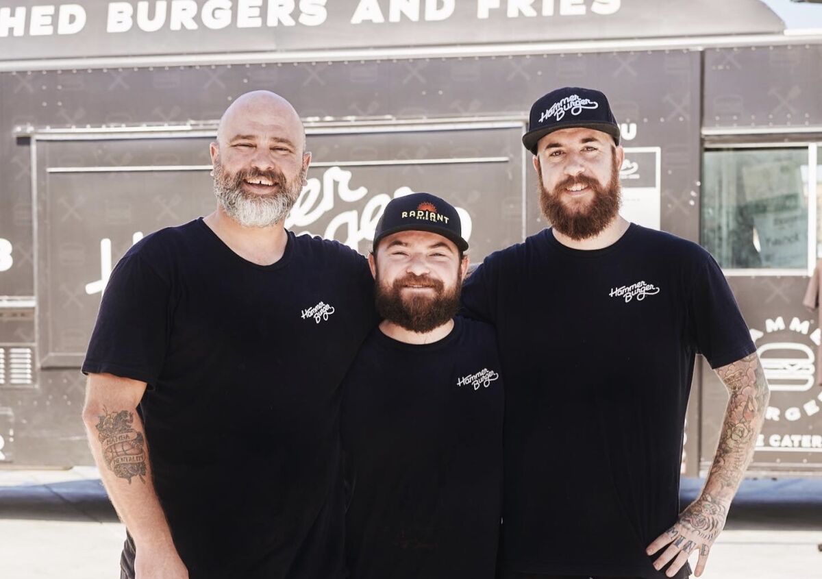 From left, Hammer Burger founder Kevin Hammons, Charles “Pepper” Massingill and Chief Operating Officer Curtis Scheetz.