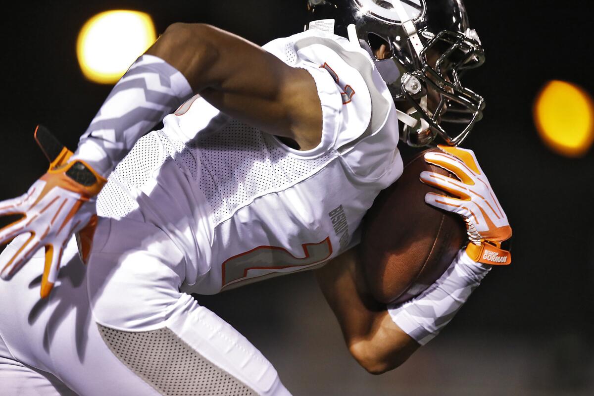 Bishop Gorman receiver Cordell Broadus returns a kick against Servite during an Aug. 29 game at Cerritos College.
