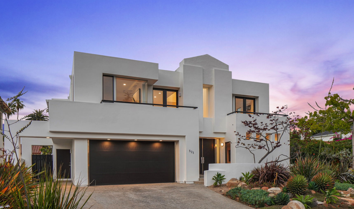 Built in 1995, the sunny two-story receives light from angled skylights and glass block windows.