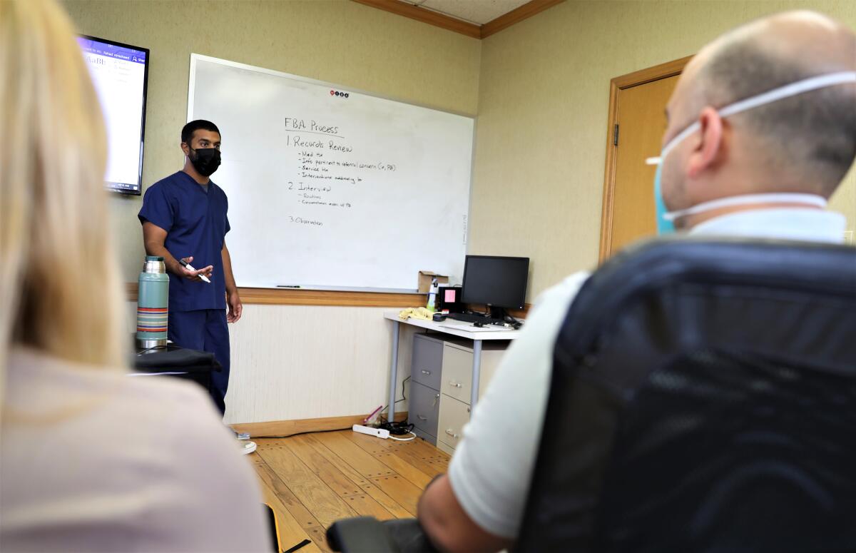 Easterseals Clinical Director Dr. Shaji Haq leads a training Thursday for Severe Behavior Services Center staff in Irvine.