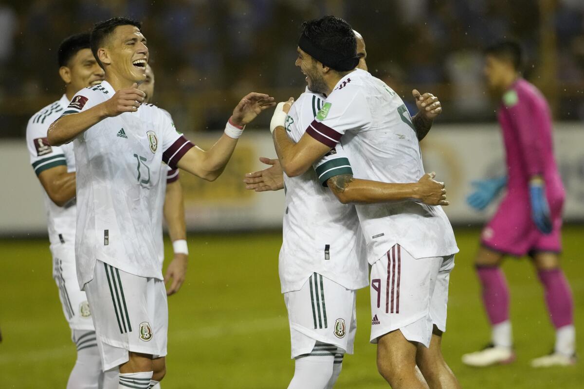 Mexico's Raul Jimenez, right, is congratulated by teammates after scoring.