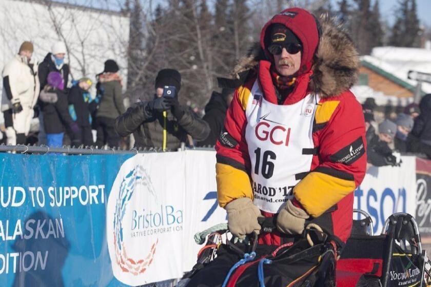 Two-time Iditarod champion Mitch Seavey takes off at the start of the 45th Iditarod Trail Sled Dog Race in Fairbanks, Alaska on March 6. He won it in record time, eight days later. It was his third Iditarod victory.